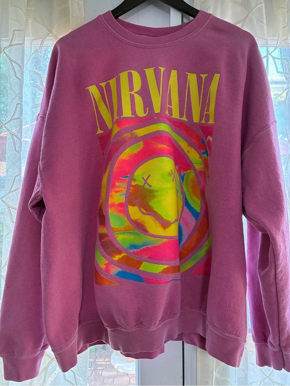 NIRVANA Pink with neon smiley face crewneck sweater.